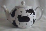 Small tea pot with black and white cat design