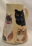 Character cat jug with 4 cats