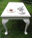 Rectangular coffee table with lovely "heart" style edging. Painted in cream - SOLD